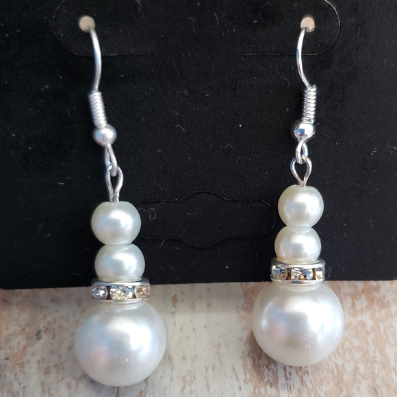 Ivory/off white pearl earrings. EACH PAIR IS SOLD FOR $15. - Picture 2 of 3